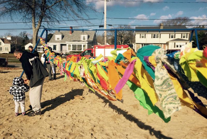 Prayers for the new year were written down on strips of fabric and hung on the beach. BY MATTHEW BERNAT